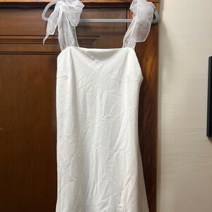 White mini dress with ribbon tie straps